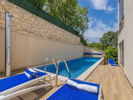 Maison Nika à Malinska : piscine chauffée, 350 m de la mer : photo 19
