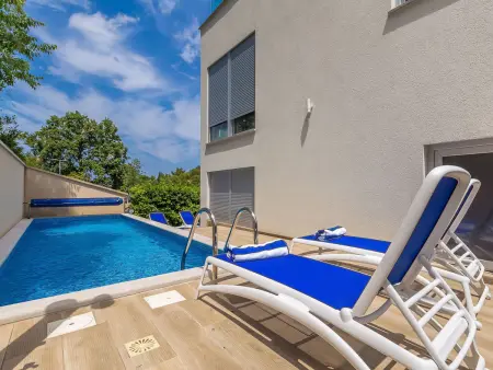 Maison Nika à Malinska : piscine chauffée, 350 m de la mer : photo 39
