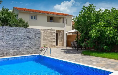 Location maison à Tinjan