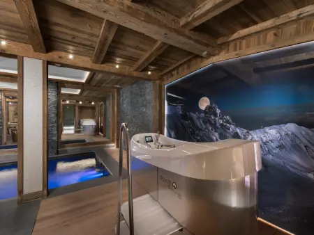 Chalet luxueux avec spa, piscine et vue sur pistes à Courchevel 1550 - Photo 11