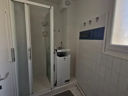 Appartement 2 pièces avec garage au centre, à 50m de la plage, climatisé : photo 15