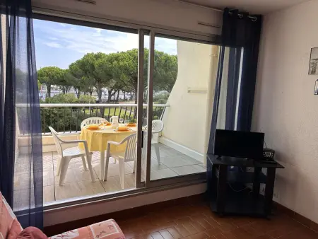 Studio cabine avec piscine et terrasse vue port, Port Camargue : photo 5