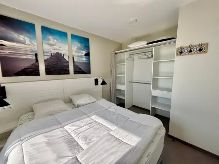Appartement 2 chambres face mer, accès plage direct, piscine chauffée : photo 12