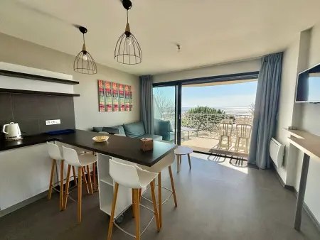 Appartement 2 chambres face mer, accès plage direct, piscine chauffée : photo 13