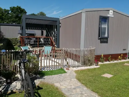 Location mobil home à Jullouville, Mobil-home confort 3 ch, piscine chauffée, 200m plage, parking, WiFi, animaux admis